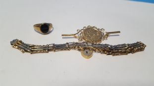 A 9 CT GOLD GATE BRACELET, A YELLOW METAL BROOCH AND A YELLOW METAL RING