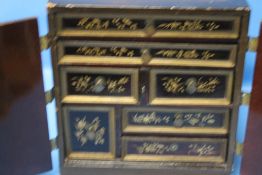 AN ORIENTAL STYLE CABINET