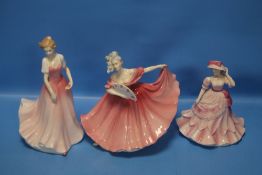 TWO ROYAL DOULTON FIGURINES 'JULIE' AND 'ELAINE' TOGETHER WITH A ROYAL WORCESTER FIGURINE 'JENNIFER'
