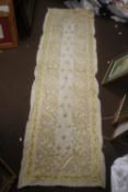 AN ANTIQUE MIDDLE EASTERN DOWRY SHAWL/CLOTH DECORATED WITH HEAVY EMBROIDERED GOLD AND SILVER WIRE
