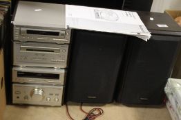 A TECHNICS MUSIC CENTRE TO INCLUDE CASSETTE DECK, CD PLAYER AND MATCHING SPEAKERS WITH INSTRUCTIONS