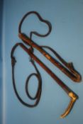 TWO VINTAGE HORSE WHIPS