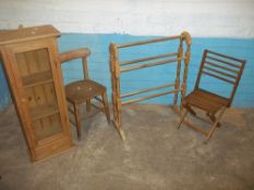 FOUR SMALL ITEMS OF FURNITURE COMPRISING A SMALL GLAZED DISPLAY UNIT, A TOWEL RAIL, A FOLDING