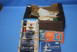 A BOX OF COLLECTABLES