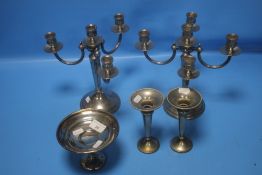 TWO WHITE METAL CANDELABRAS, TWO WHITE METAL CANDLESTICKS AND A WHITE METAL DISH