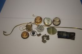 A YELLOW METAL CAMEO BROOCH and a quantity of assorted costume jewellery