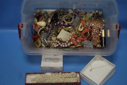A BOX OF COSTUME JEWELLERY