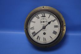 A SMITH EIGHT DAY SHIPS CLOCK (NO KEY) Condition Report:TICKS WHEN SHAKEN BUT WE GIVE NO GUARANTEE