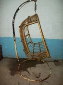 A GARDEN HAMMOCK SWINGING CHAIR