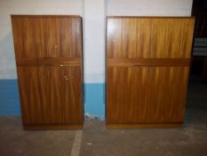 A TWO PIECE BEDROOM SUITE IN TEAK TO INCLUDE TWO WARDROBES BY UNIFLEX FURNITURE