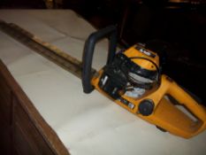 A JCB PETROL HEDGE CUTTER/TRIMMER