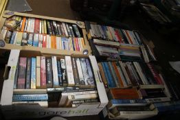 FOUR TRAYS OF PAPERBACK NOVELS