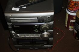 A JVC MUSIC CENTRE WITH MATCHING SPEAKERS, REMOTE AND INSTRUCTIONS