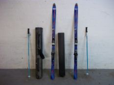 A SET OF VOLKI SKIS AND A SKI TRAVEL CASE