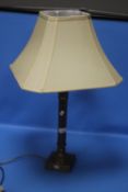 A TABLE LAMP WITH SHADE