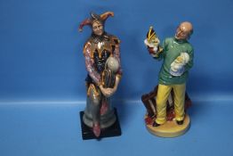 TWO ROYAL DOULTON FIGURES TO INCLUDE 'PUNCH AND JUDY MAN' AND 'THE JESTER' (2)