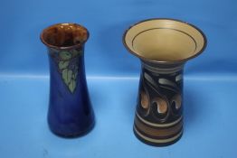 A ROYAL DOULTON LAMBETH VASE WITH FRUIT DECORATION TOGETHER WITH A DENBY VASE (2)