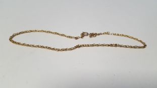 A YELLOW METAL RING TOGETHER WITH A THIN 9 CT GOLD BRACELET 1.2 g