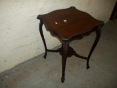 AN EDWARDIAN MAHOGANY SIDE TABLE