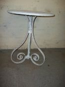 AN ANTIQUE WROUGHT IRON GARDEN TABLE (REPAIRED)