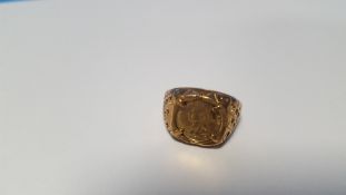 A 9 CT GENT'S COIN RING 3.5 g