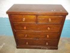 AN ANTIQUE MAHOGANY TWO OVER THREE CHEST OF DRAWERS