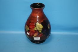 A WALTER MOORCROFT VASE, FLAMBE CLEMATIS PATTERN C. 1950, H 25 CM