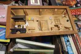 A SMALL BOX OF COOKERY BOOKS AND A FRAMED WOODEN KITCHEN SCENE