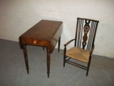 AN ANTIQUE DROP LEAF TABLE AND AN ODD CHAIR
