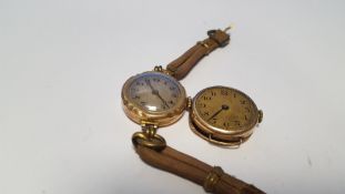 A 9 CT GOLD LADIES WATCH FACE TOGETHER WITH A YELLOW METAL WRIST WATCH