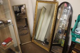 THREE MIRRORS TO INCLUDE AN ARCHED SHAPED EXAMPLE, THE LARGEST 128 X 70 CM