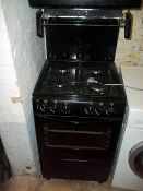A NEWORLD EYE LEVEL GAS COOKER