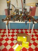 A SELECTION OF NEW REFLECTIVE VESTS AND HAND TOOLS