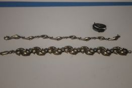 TWO STERLING SILVER DOLPHIN BRACELETS AND A SIMILAR RING