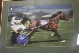 A LARGE FRAMED PHOTOGRAPH OF HARNESS RACING, 103 X 80 CM