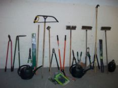 A QUANTITY OF GARDEN TOOLS INCLUDING LOPPERS, BRUSHES AND A WATERING CAN