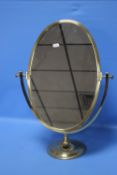 A MODERN BRASS SWING MIRROR