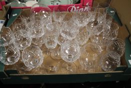 A TRAY OF CUT GLASS AND PRESS GLASS BRANDY / WINE ETC. (TRAY NOT INCLUDED)