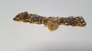 A 9 CT GOLD GATE BRACELET 10.4 g