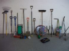 A QUANTITY OF GARDEN TOOLS TO INCLUDE SPADES, FORKS, RAKES ETC.