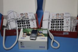 TWO BOXED TELEPHONES AND A BOXED NOKIA 2310
