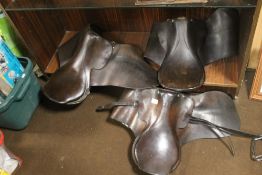 TWO VINTAGE ENGLISH LEATHER SADDLES, ONE A/F, TOGETHER WITH A VINTAGE ENGLISH LEATHER SADDLE WITH