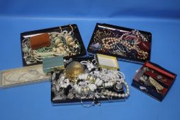 A BOX OF COSTUME JEWELLERY TO INCLUDE BEADED NECKLACES, DRESS RINGS ETC.