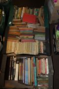 THREE TRAYS OF BOOKS TO INCLUDE HARDBACKS AND PAPERBACKS, WESTERNS ETC.