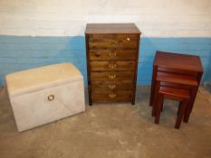A PINE SIX DRAWER CHEST, A MODERN NEST OF THREE TABLES AND AN OTTOMAN (3)