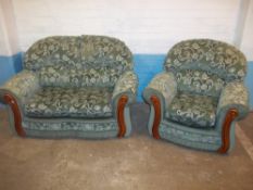 A TWO PIECE SUITE COMPRISING TWO SEATER SOFA AND A CHAIR