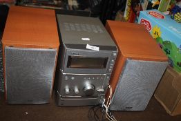 A SONY CD AND TAPE PLAYER WITH MATCHING SPEAKERS