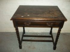 AN OAK BARLEY TWIST HALL TABLE WITH DRAWER