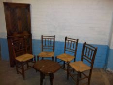 SIX PIECES OF FURNITURE TO INCLUDE A LEADED OAK LINENFOLD CORNER UNIT, FOUR ANTIQUE RUSH SEATED