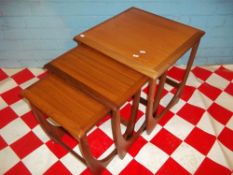 A TEAK RETRO G-PLAN NEST OF THREE TABLES